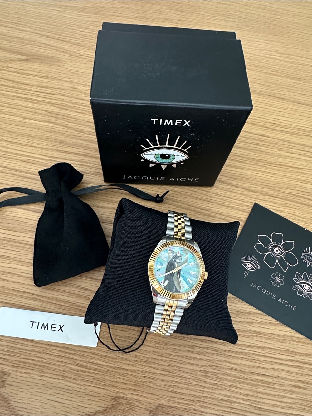 Timex Two-Tone Gold and Silver Watch with Iridescent Blue-Green Dial